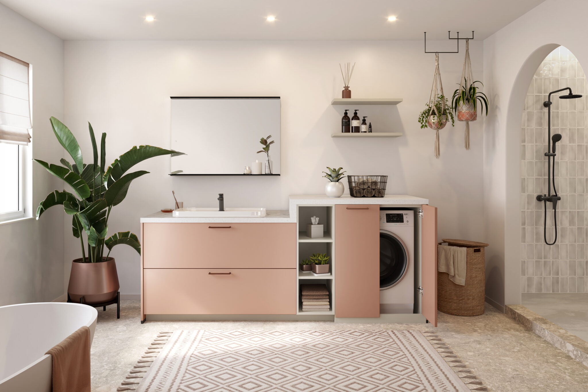 Salle de bain moderne avec meuble rose, plantes suspendues, machine à laver intégrée et douche à l'italienne sur carrelage beige.