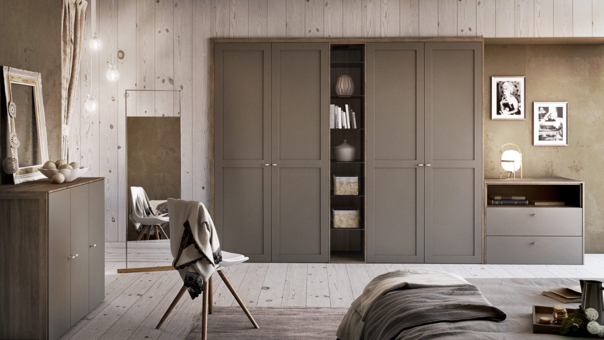 Un dressing avec des portes grises, une étagère centrale ouverte avec livres et paniers, et des cadres photo sur un mur beige.