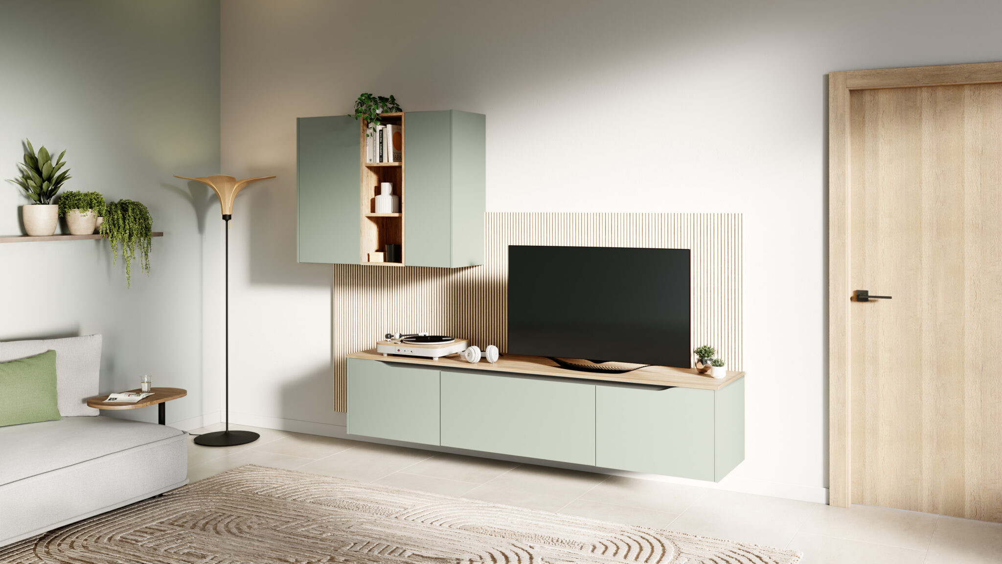 Un salon moderne avec un meuble TV vert clair, une télévision, une platine vinyle, des plantes et un lampadaire sur fond de mur beige.